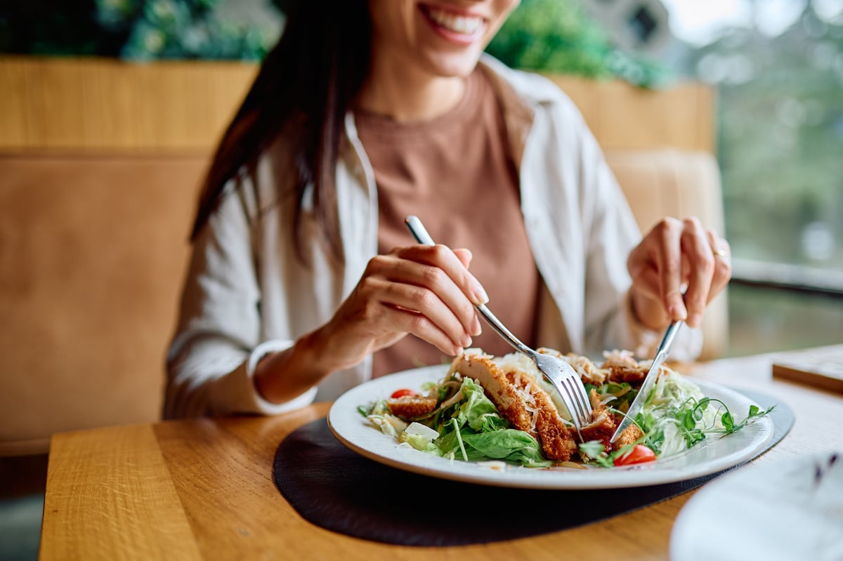 Healthy meal with salmon salad containing omega-3 rich foods for hearing support